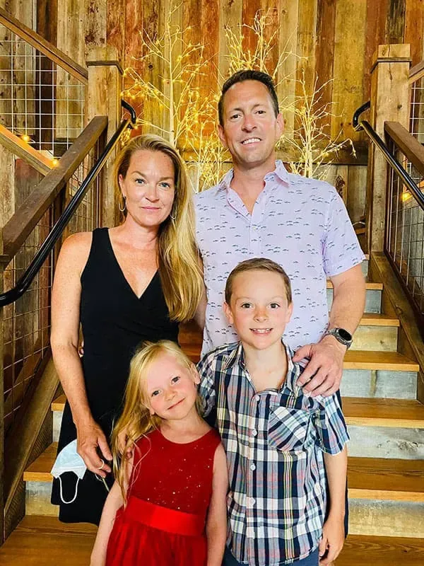 Ryan Norman, founder of Norman Builders, with his family