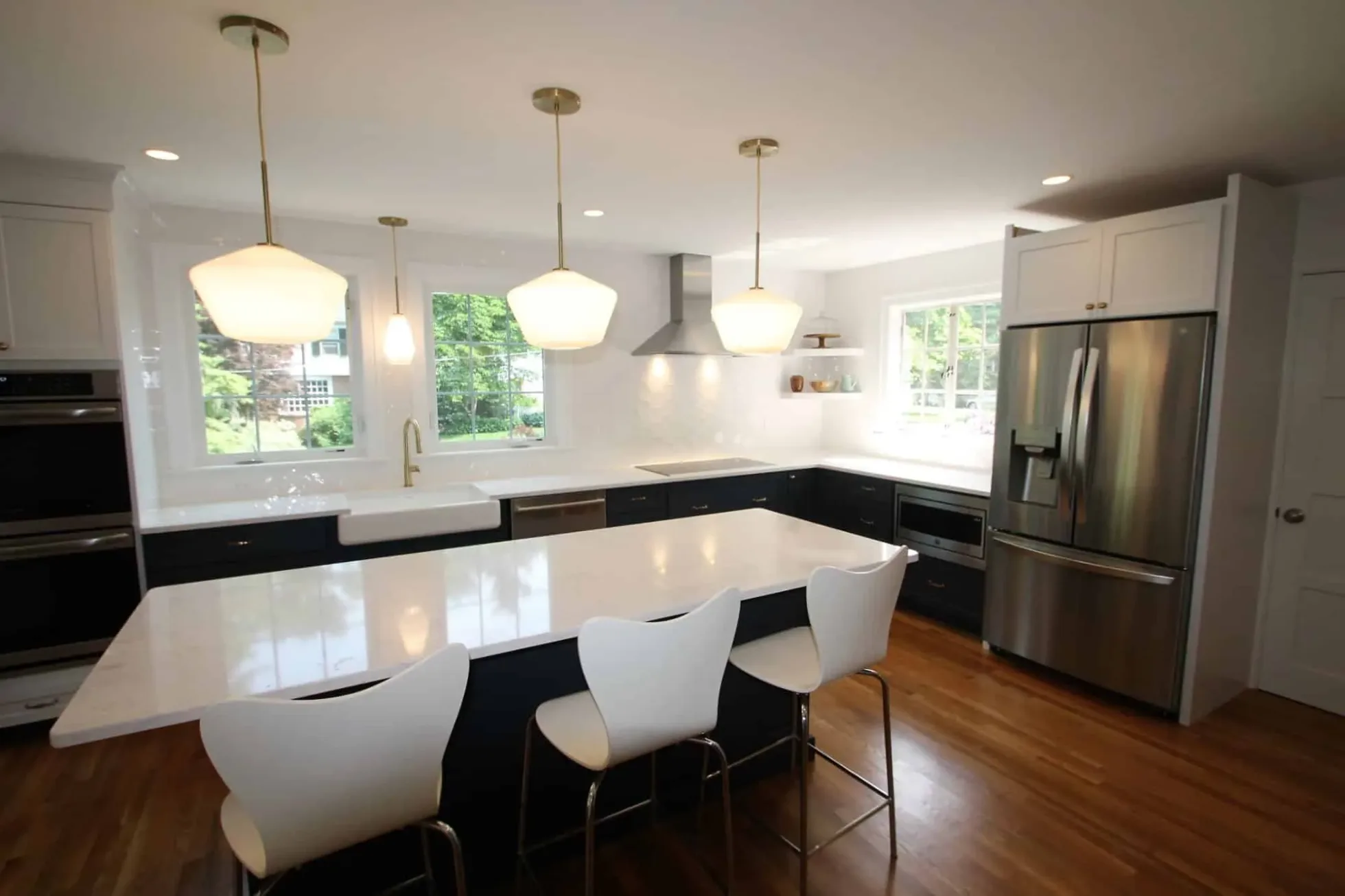Two-tone kitchen with dark lower cabinets and white uppers, Andover MA