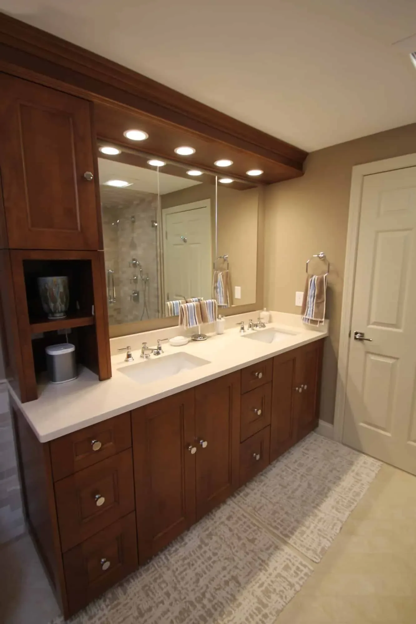 Stained wood double vanity with stone tile, Byfield MA primary bath
