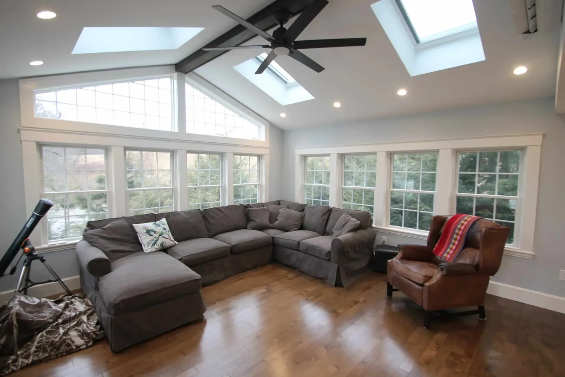 Vaulted family room with exposed beams and skylights, Groveland MA first-floor remodel