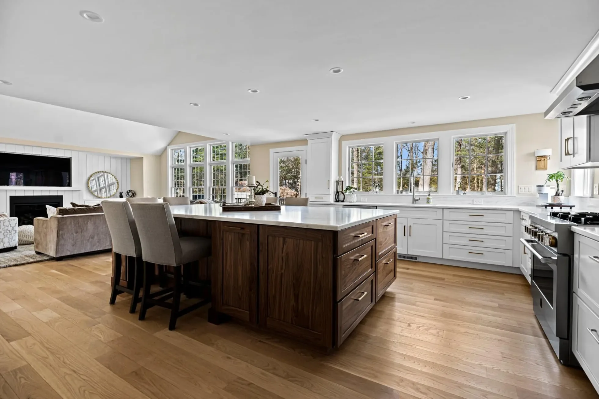Painted shaker kitchen with a custom walnut island open to the family room, North Andover MA whole-home renovation